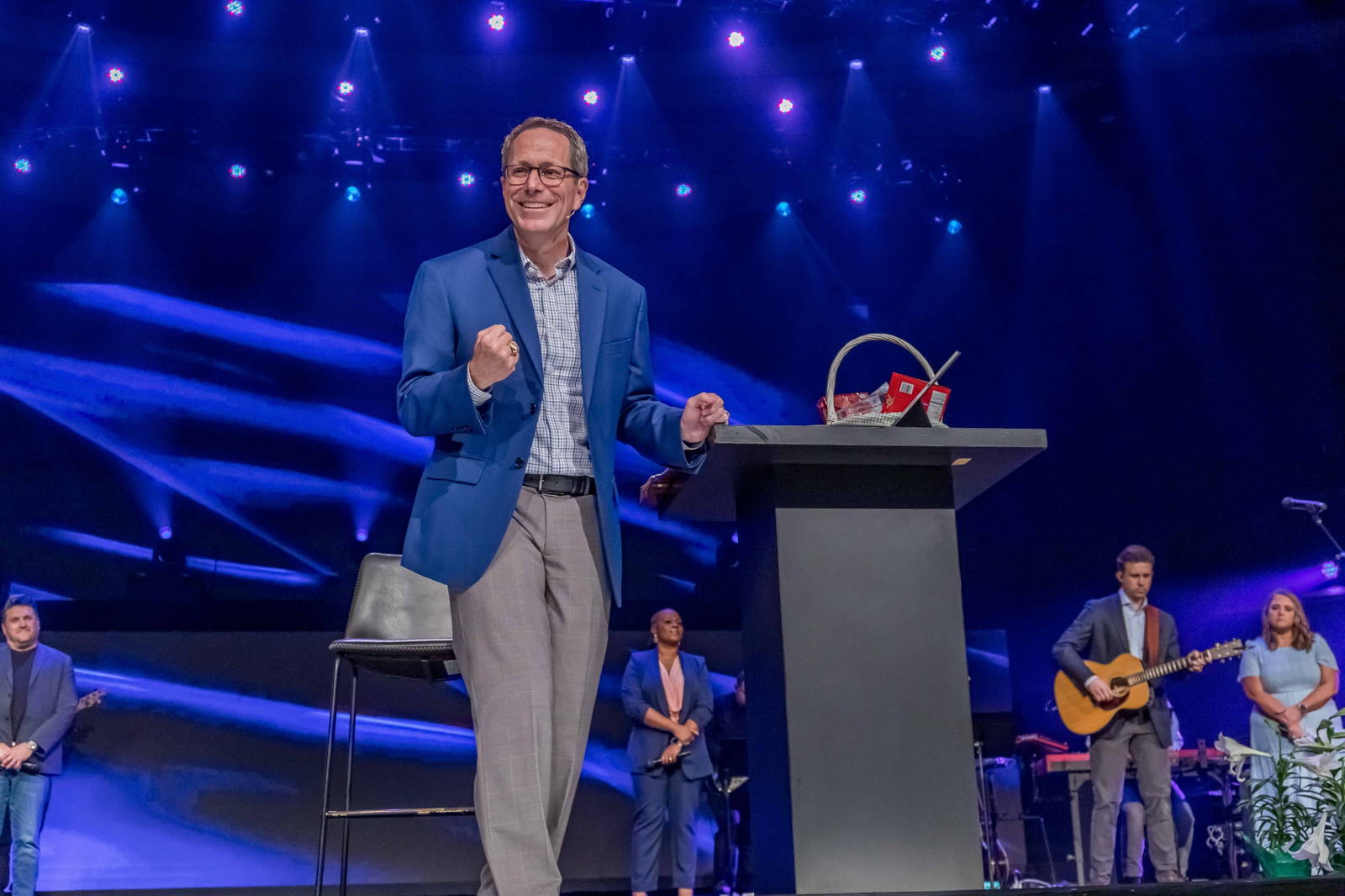 Pastor Greg on stage with the Worship Band