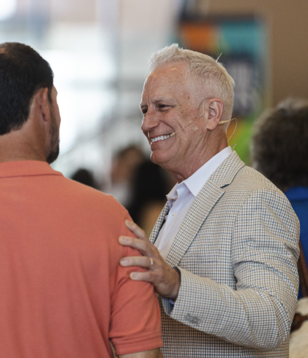 Image of Houston's First Pastor greeting churchgoers